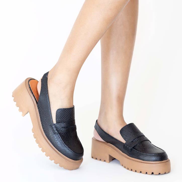 Elodie platform mules in black embossed leather