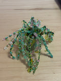 Pink and teal beaded plant