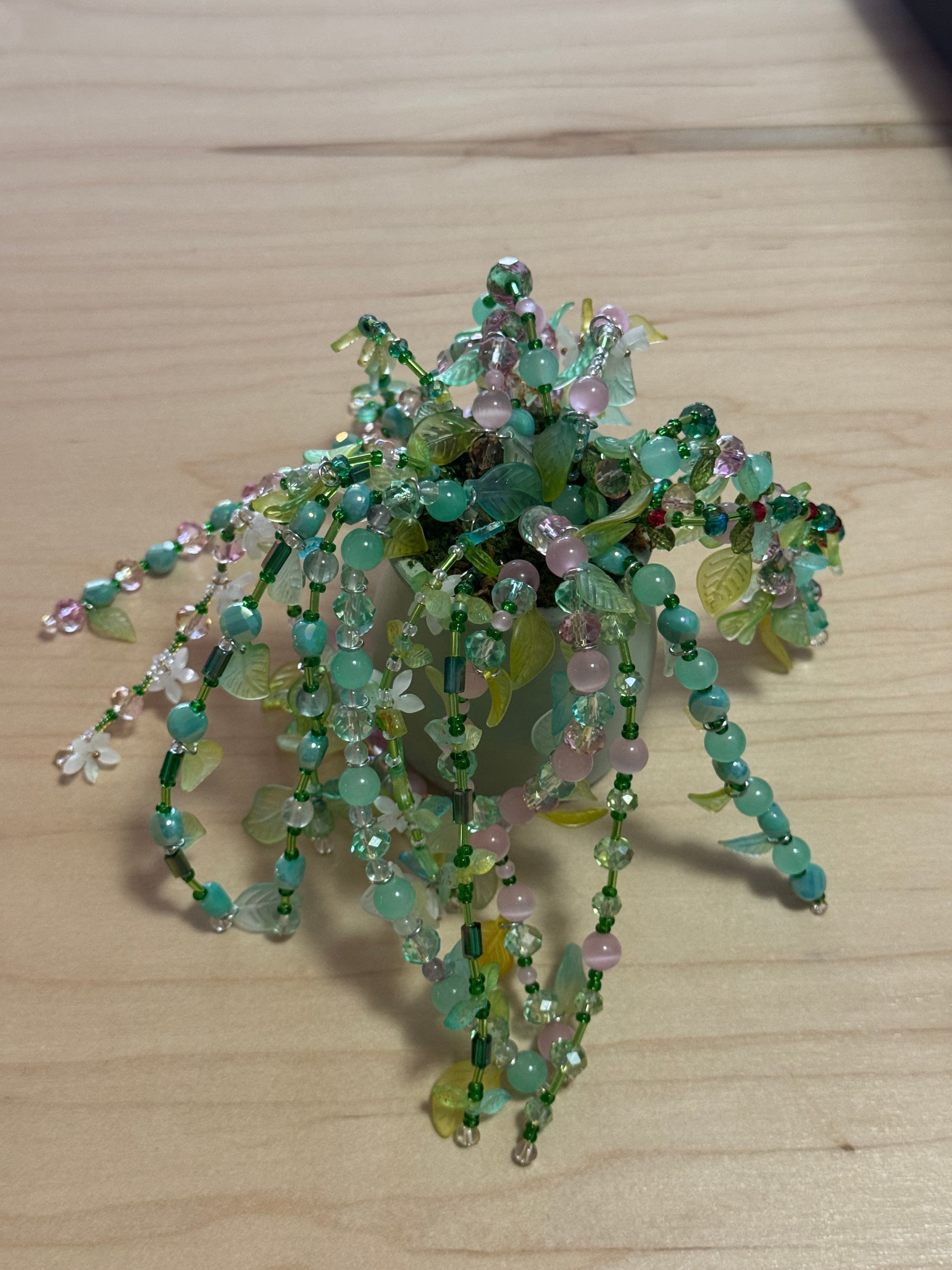 Pink and teal beaded plant