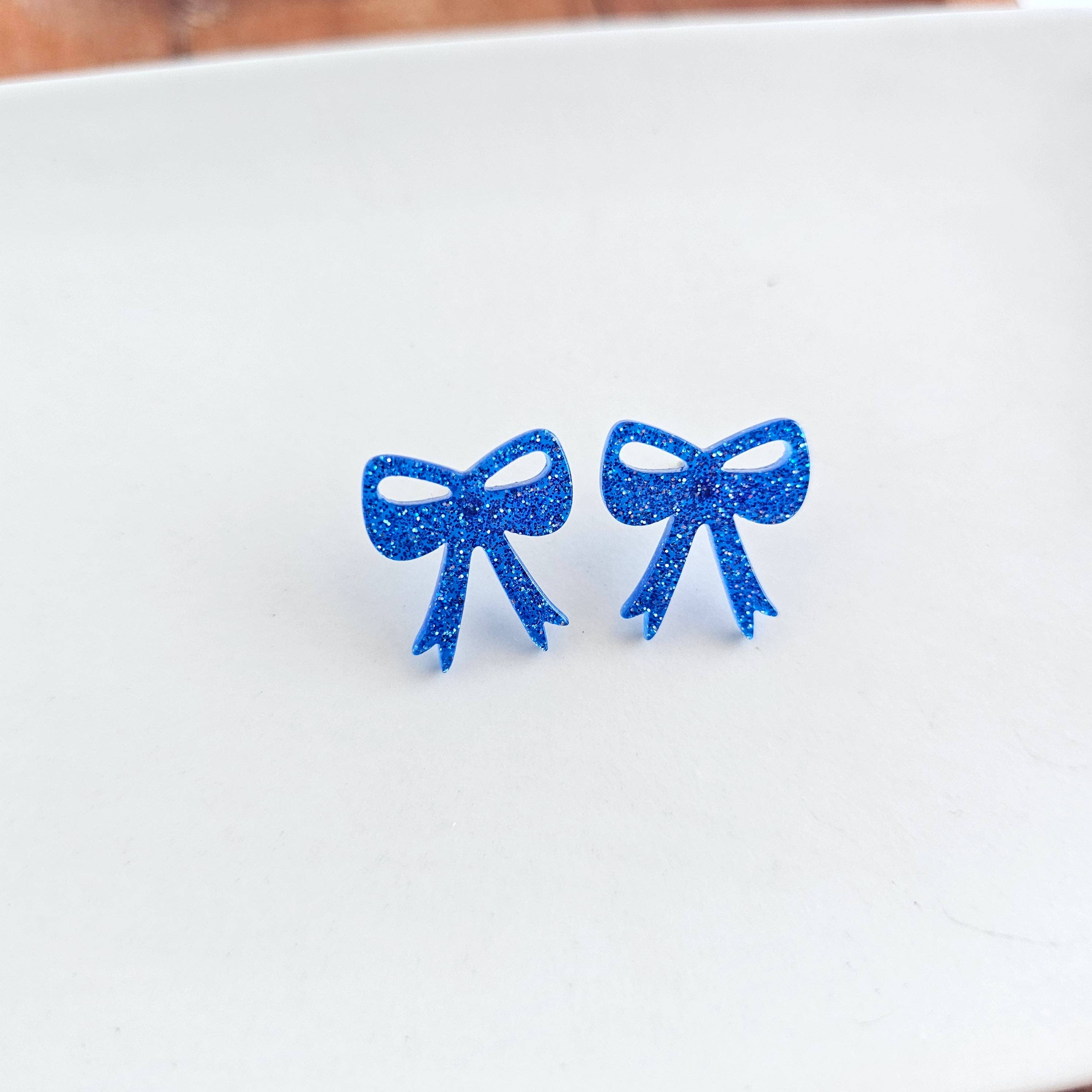 Blue Glitter Bow Studs