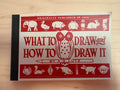 Book titled 'What to Draw and How to Draw It' by E.G. Lutz on a wooden surface