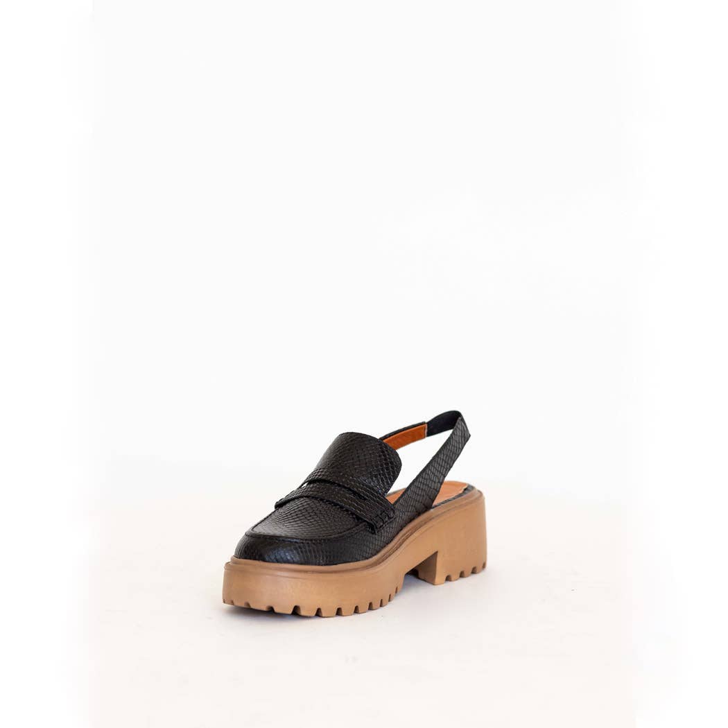 Elodie platform mules in black embossed leather
