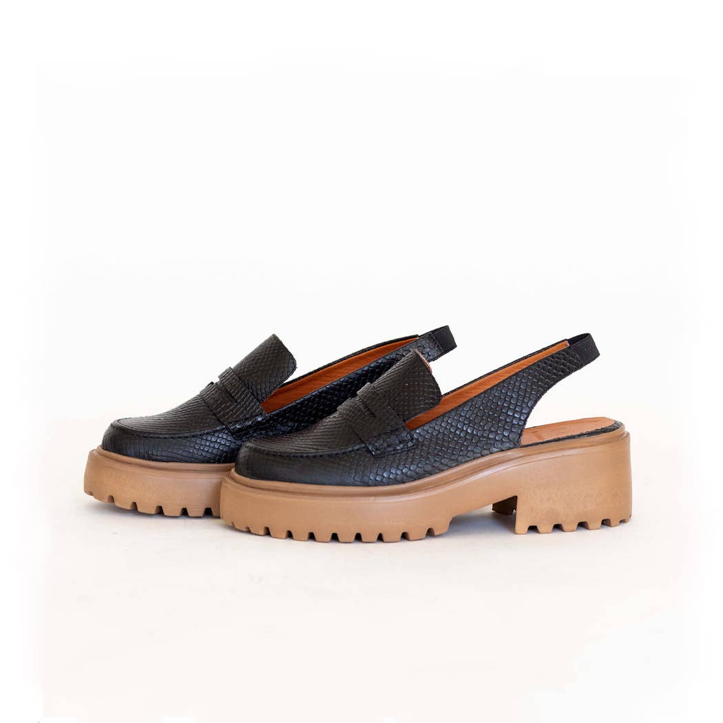 Elodie platform mules in black embossed leather