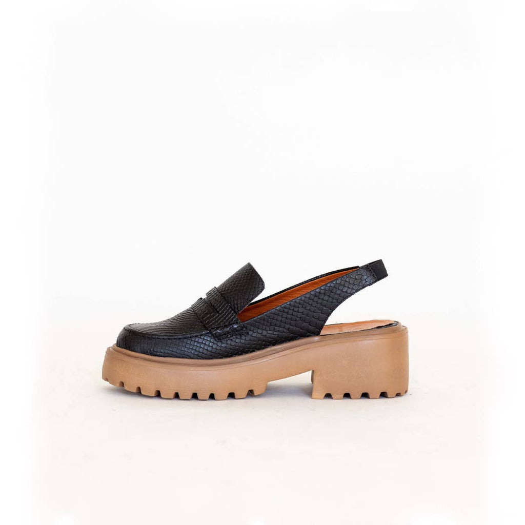 Elodie platform mules in black embossed leather